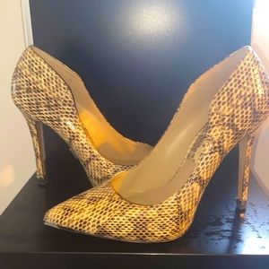 Michael Kors Avra genuine snakeskin pumps.. open for offers